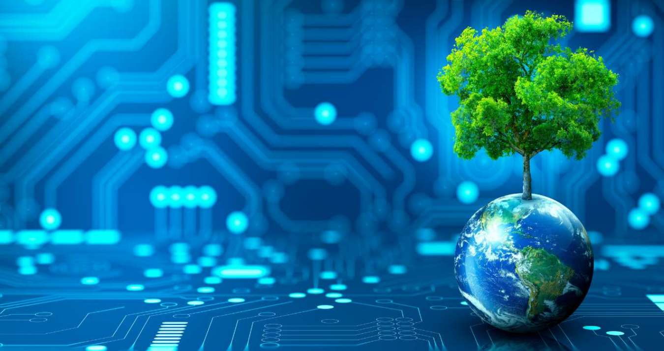 A imagem é de uma árvore crescendo na Terra com um fundo abstrato azul. Ela representa conceitos relacionados à tecnologia ambiental, Dia da Terra, economia de energia, sustentabilidade, ética corporativa e proteção ambiental. A imagem também inclui elementos fornecidos pela NASA.
