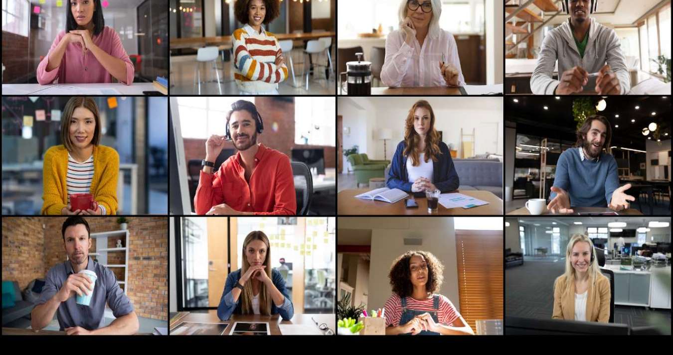 A imagem retrata uma interface de videoconferência com doze colegas de trabalho diversificados, homens e mulheres, na tela. Eles parecem estar se comunicando e interagindo por meio dessa plataforma de trabalho remoto. A imagem sugere a ideia de uma equipe trabalhando de forma colaborativa e eficiente, mesmo estando em locais diferentes.